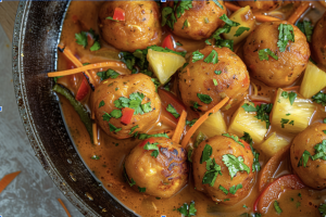 A bowl of minced fish balls in delicious Chinese style sweet and sour sauce for sweet and sour fish recipe