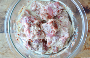 Raw, tender mutton pieces marinated in a mixture of yogurt and spices for Mutton Yakhni recipe